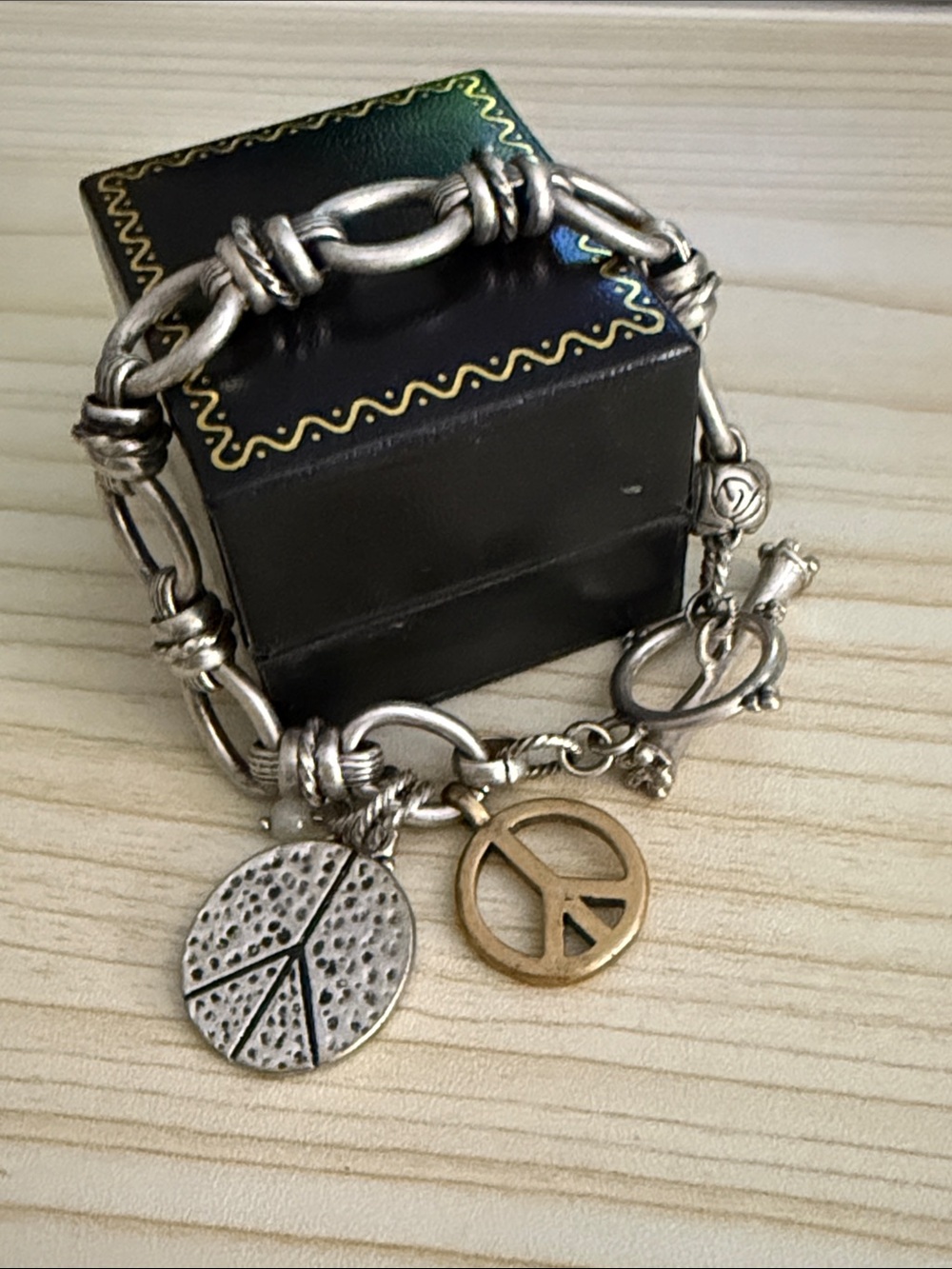 Lucky Brand Two-Tone Peace Sign Charm Bracelet in Silver and Gold